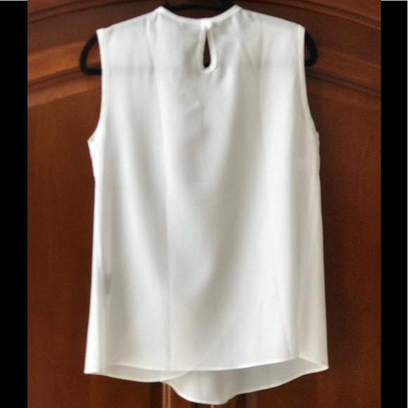 Ruffled White Sleeveless Top by Rebecca Tatti M - Picture 2 of 7